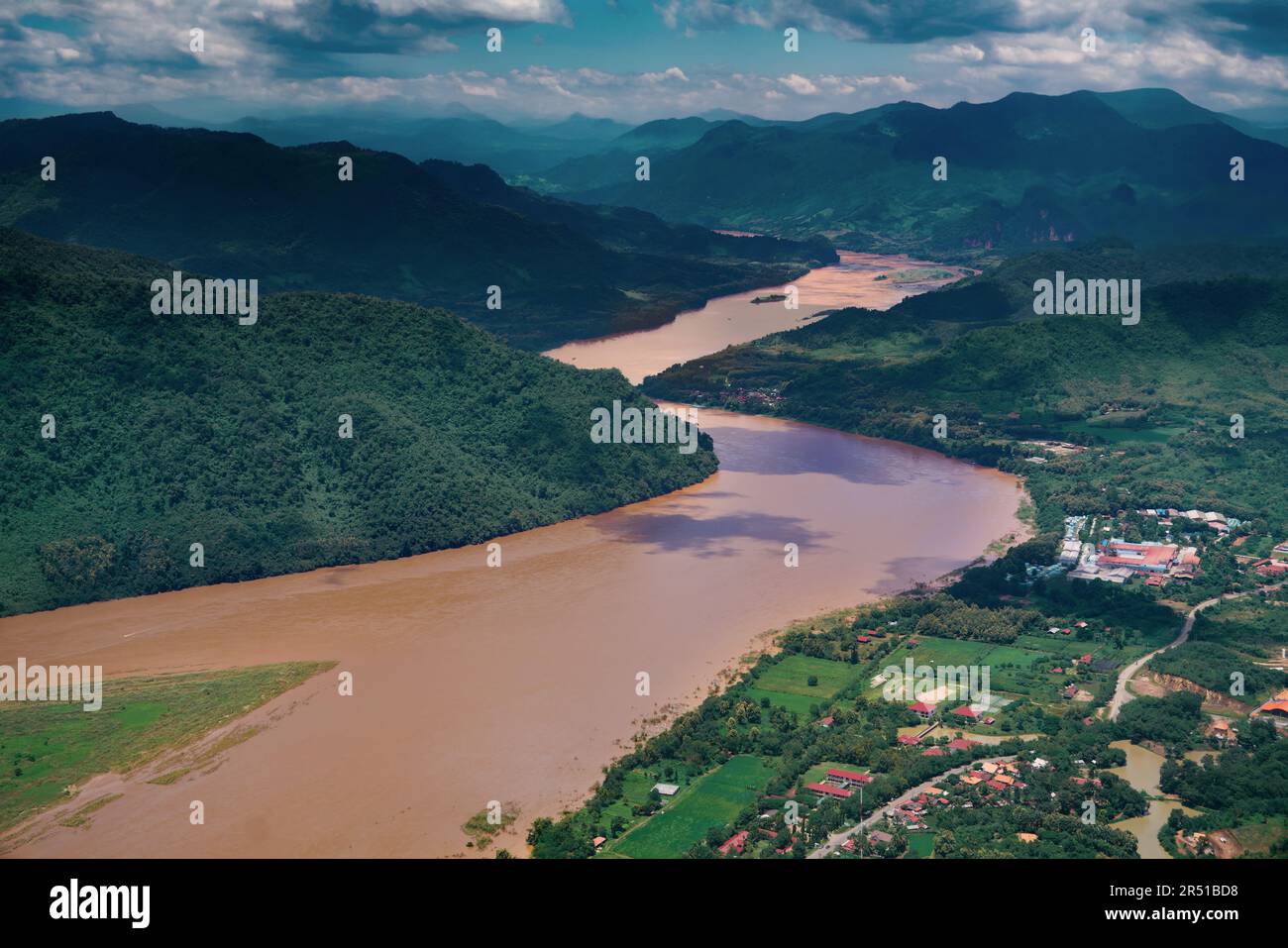 Aerial View Of The Mekong River And Surrounding Lush Mountains On aerial-view-of-the-mekong-river-and-surrounding-lush-mountains-on