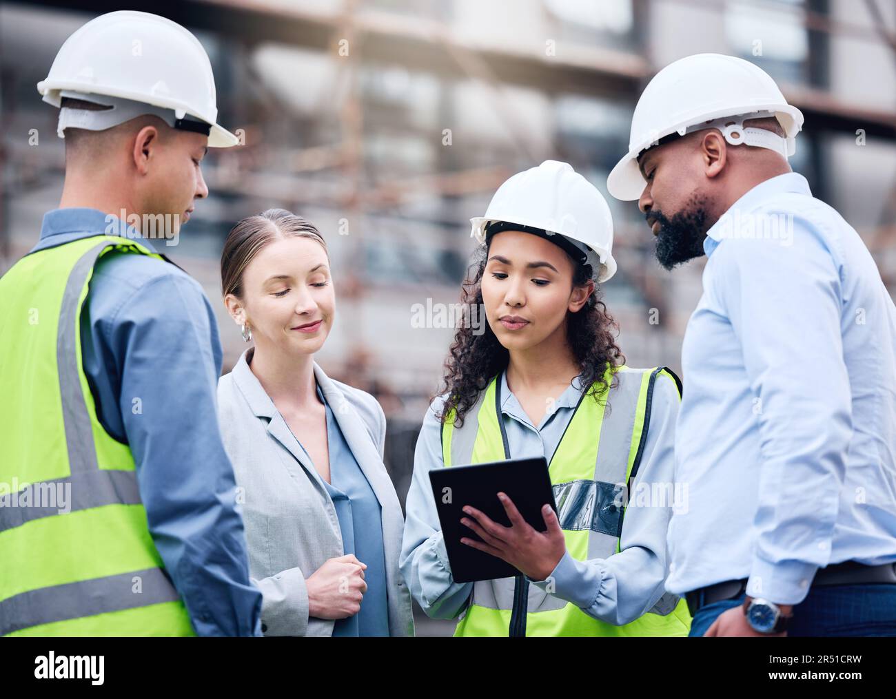 Building, construction and group with architect on tablet, project ...
