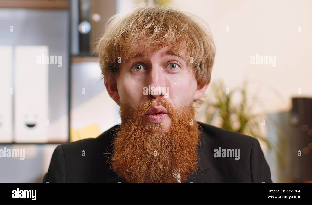 Amazed confused bearded young hi-res stock photography and images - Alamy