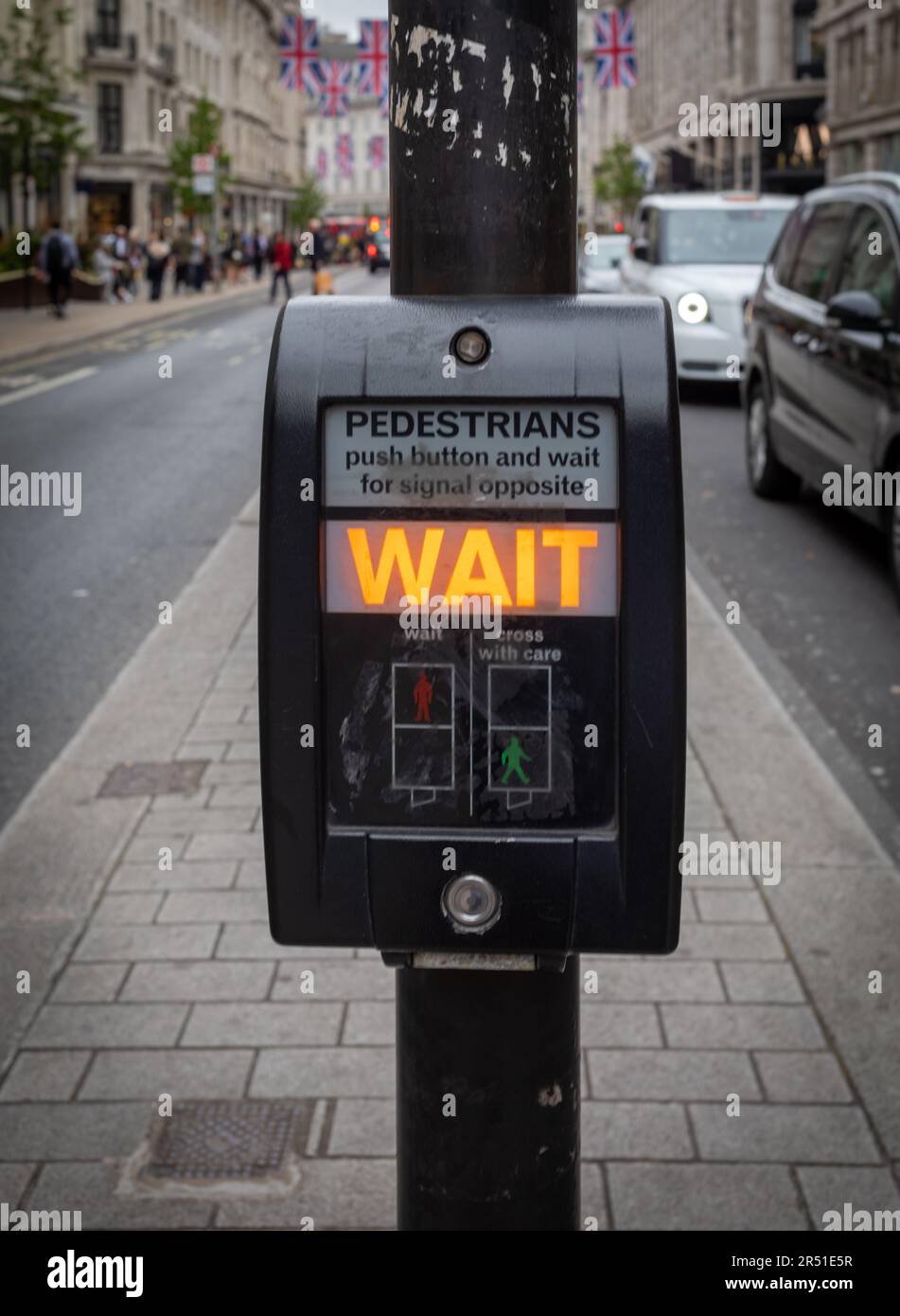 Pushbutton control for pedestrian crossing known as pelican crossing in London, UK. Stock Photo
