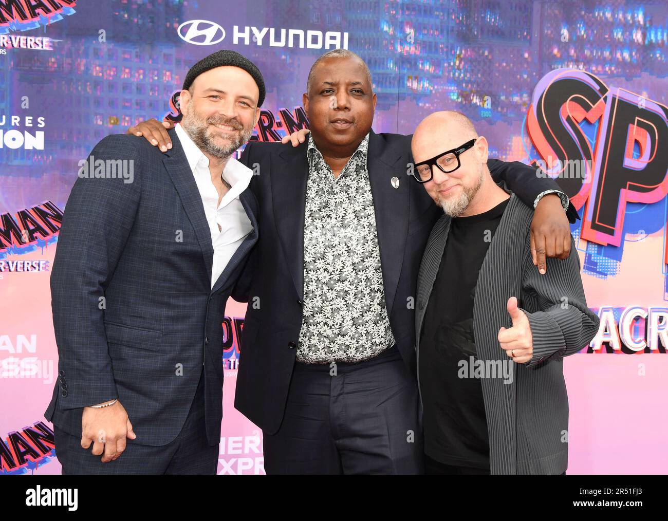 Los Angeles, Ca. 30th May, 2023. (L-R) Joaquim Dos Santos, Kemp Powers and Justin K. Thompson attend the world premiere of 'Spider-Man: Across The Spider-Verse' at Regency Village Theatre on May 30, 2023 in Los Angeles, California. Credit: Jeffrey Mayer/Jtm Photos/Media Punch/Alamy Live News Stock Photo