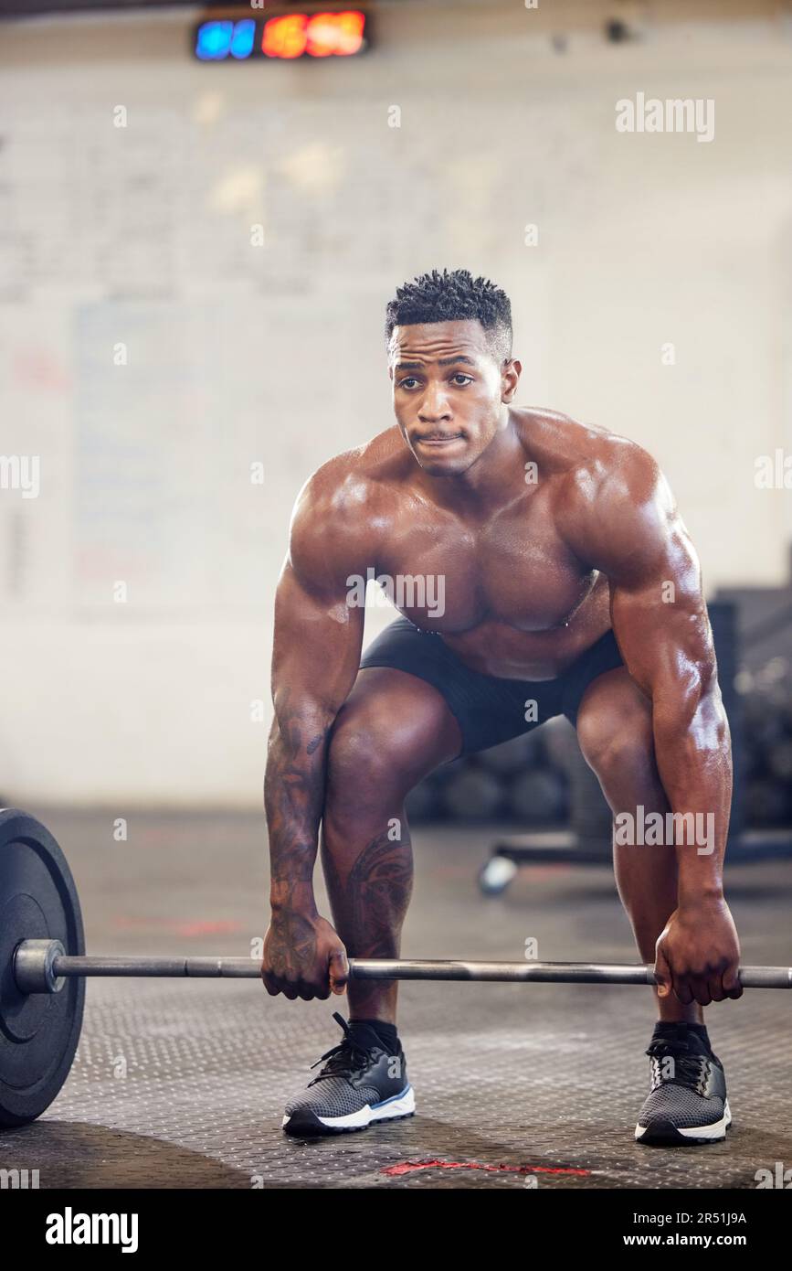 Black man, fitness and bodybuilder weightlifting for workout, exercise