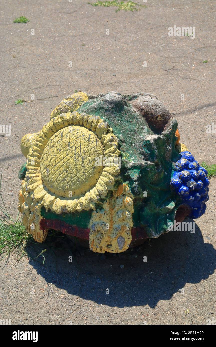 The photo was taken in the city of Odessa in Ukraine in a public park called Dyukovsky Garden. The photo shows an old concrete park decoration from th Stock Photo