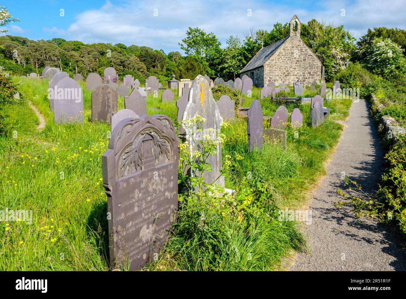 Eglwys Sant Tysilio / St Tysilio's Church on a tidal island in the Menai Straights, Anglesey, Wales Stock Photo