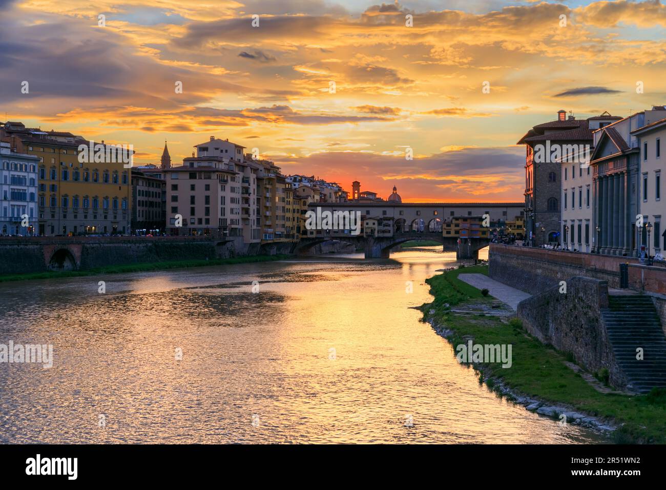Sunset on the Arno River in Florence, Italy: in the background Ponte Vecchio. Stock Photo