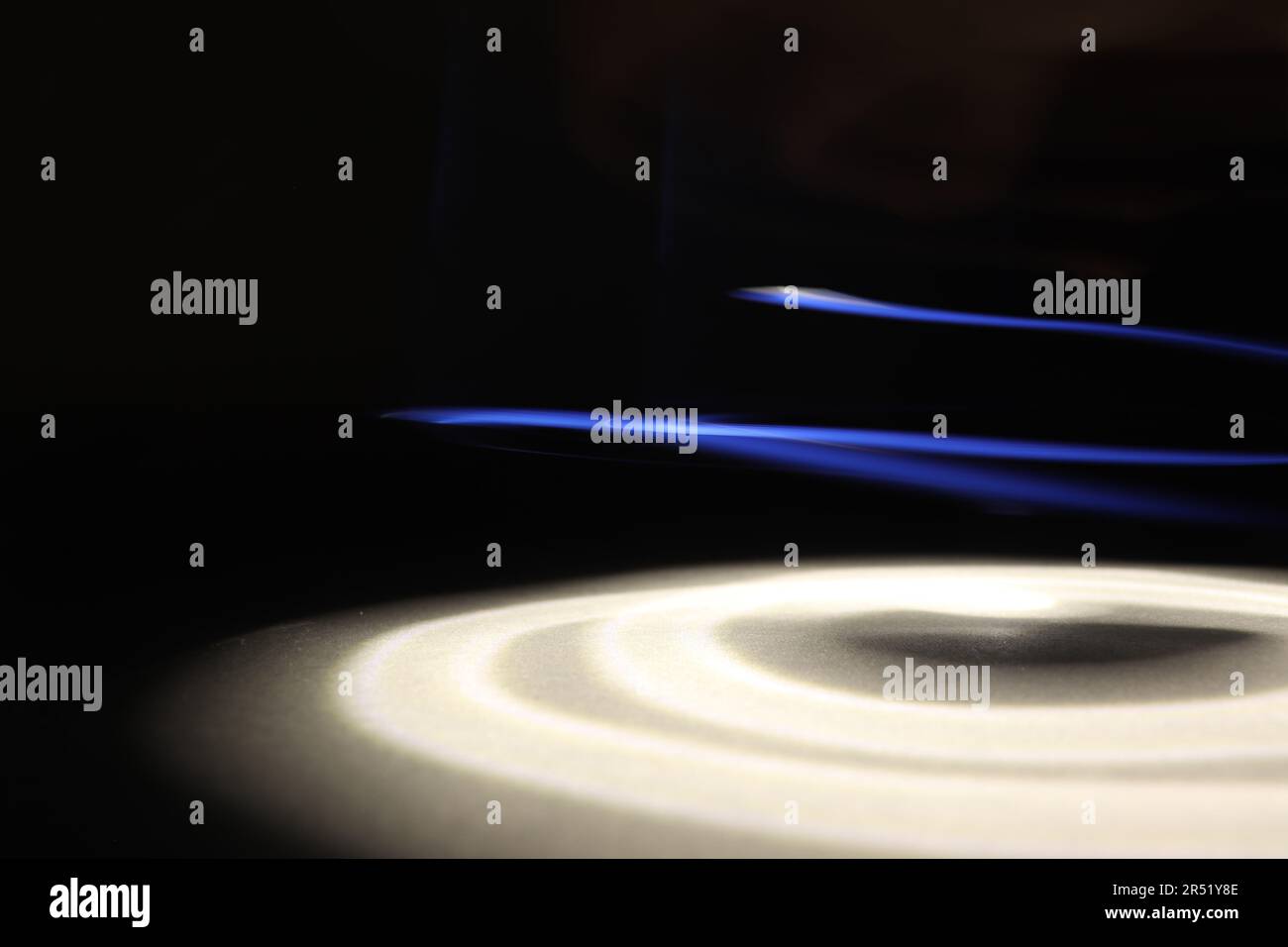 White and Blue Light Painting Forming a Christmas Tree Looksalike