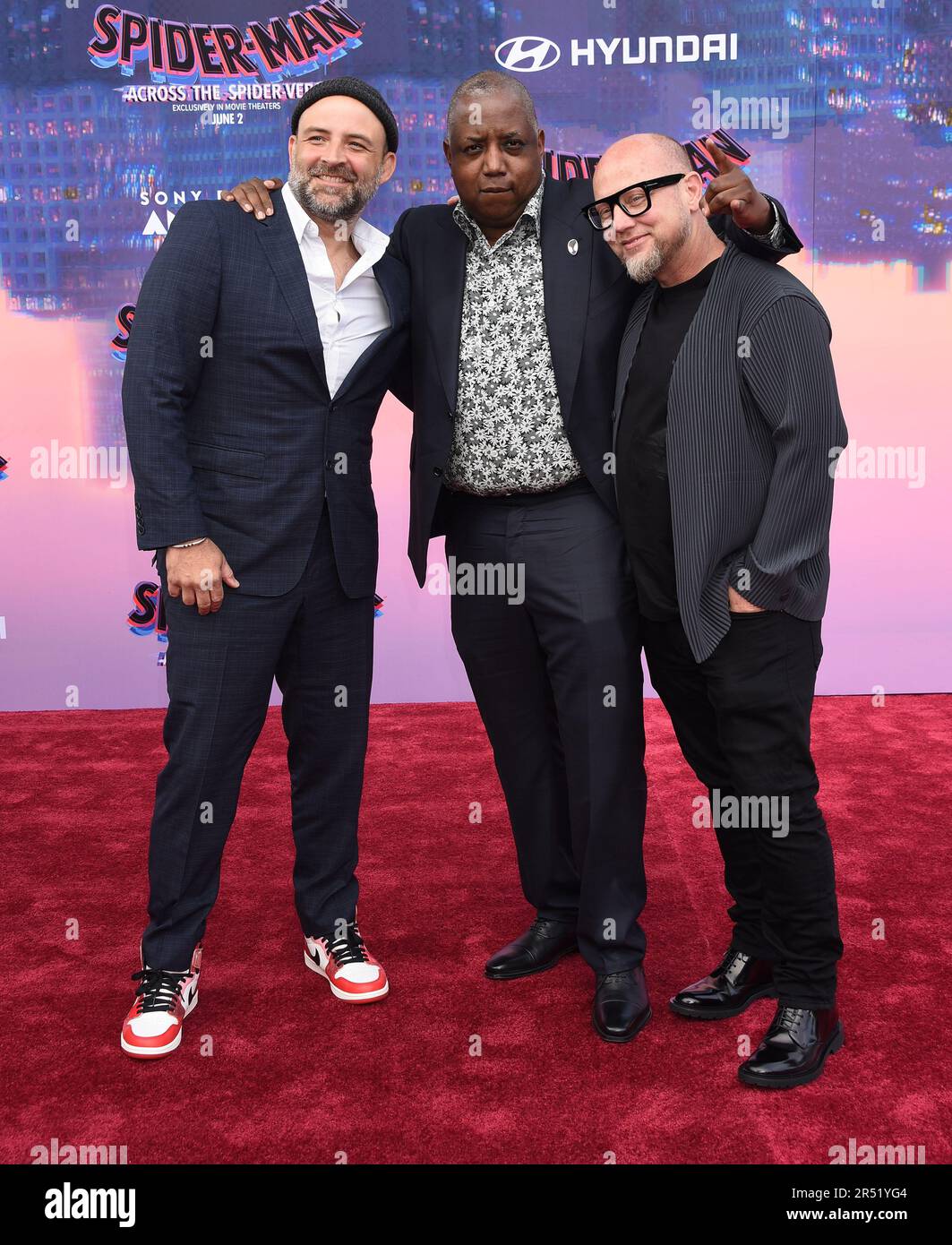 Los Angeles, CA, US, May 30, 2023. Los Angeles, USA. 30th May, 2023. Joaquim Dos Santos, Kemp Powers and Justin K. Thompson arriving to Sony Picture's “Spider-Man: Across The Spider-Verse” World Premiere held at the Regency Village Theatre in Los Angeles, CA on May 30, 2023. © Janet Gough/AFF-USA.COM Credit: AFF/Alamy Live News Stock Photo