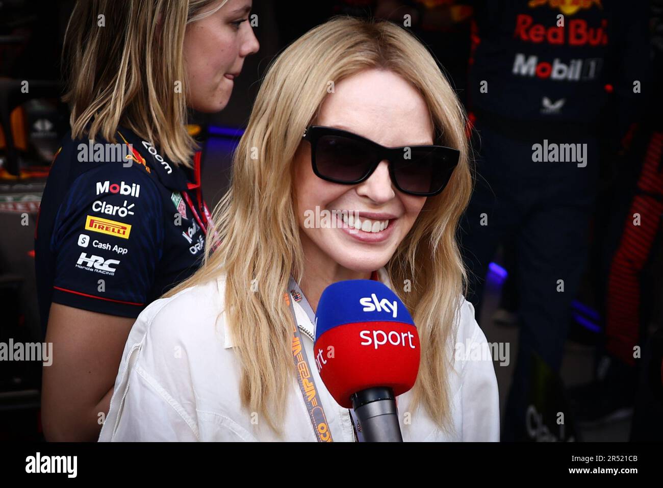 Kylie Minogue is seen in Red Bull Racing garage during the F1 Grand