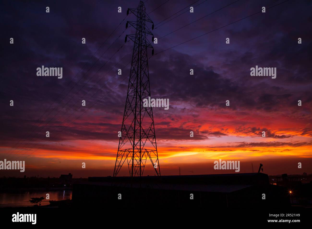 High voltage power line tower with beautiful sky at sunset, stock photo ...
