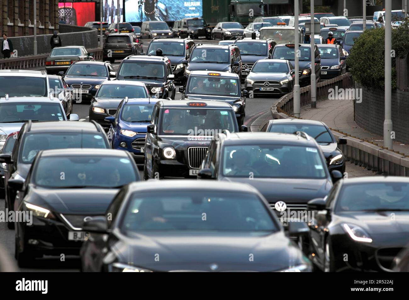 Rush hour traffic heading west out of London on West Cromwell Road in West Kensington. (In the direction of Hammersmith and the M4.) Stock Photo