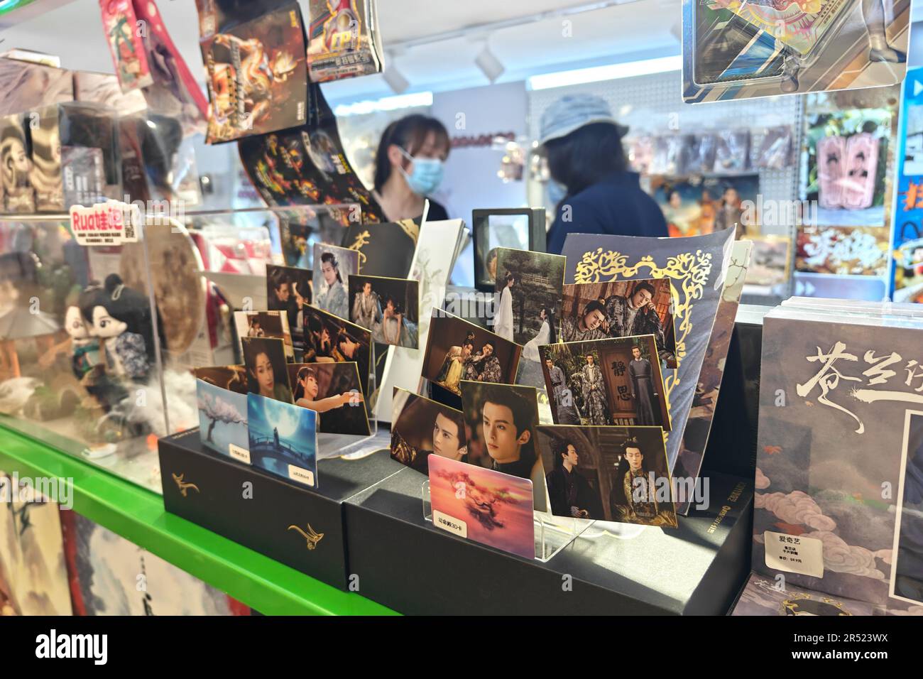 Shanghai, China. 31st May, 2023. People watch a variety of licensed products related to celebrities, IP addresses and TV shows at the iQiyi Authorized store in a shopping mall in Shanghai, China, May 31, 2023. (Photo by Costfoto/NurPhoto) Credit: NurPhoto SRL/Alamy Live News Stock Photo