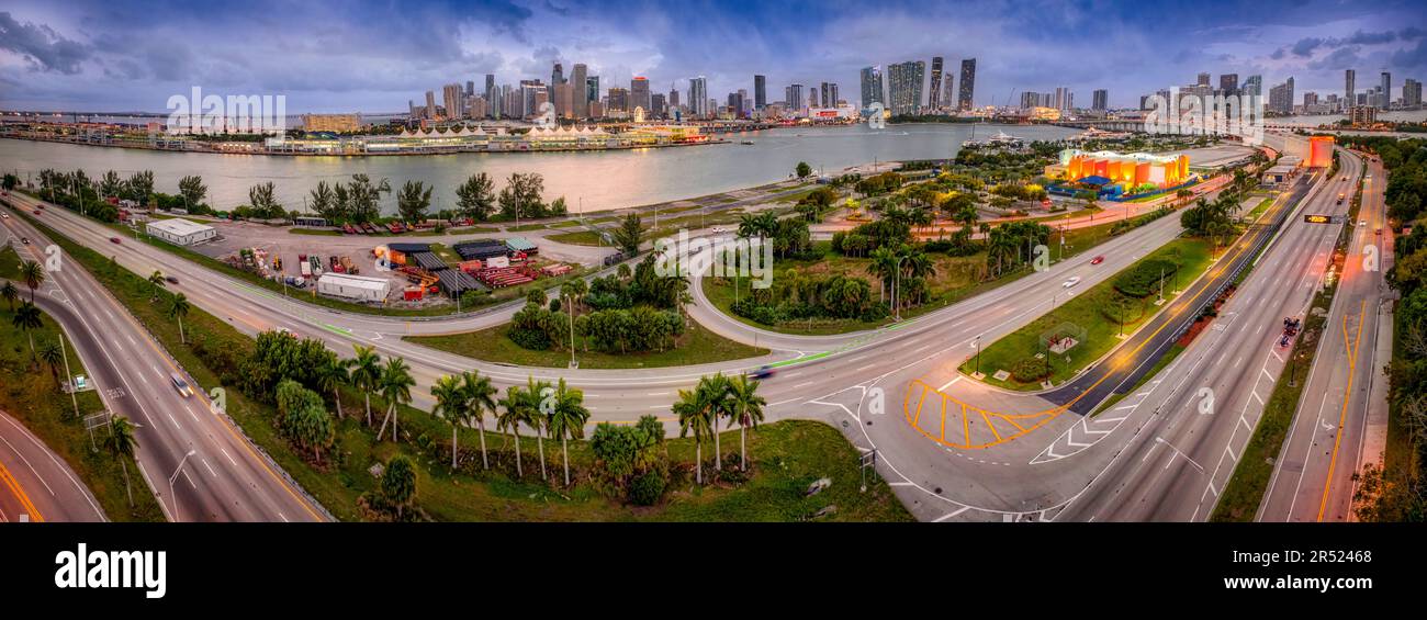 Miami FL Skyline Pano - Aerial panoramic view of the Miami, Florida skyline. Aside from the many roads leading to the modern skyline, also seen is  th Stock Photo