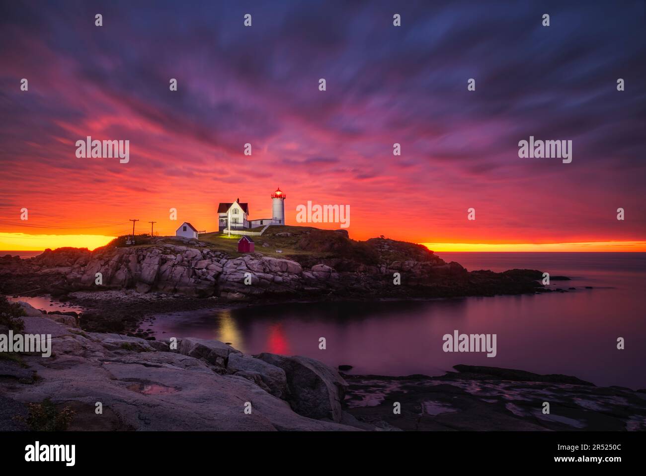 Nubble Lighthouse Sunrise View of a beautiful dramatic sky with the
