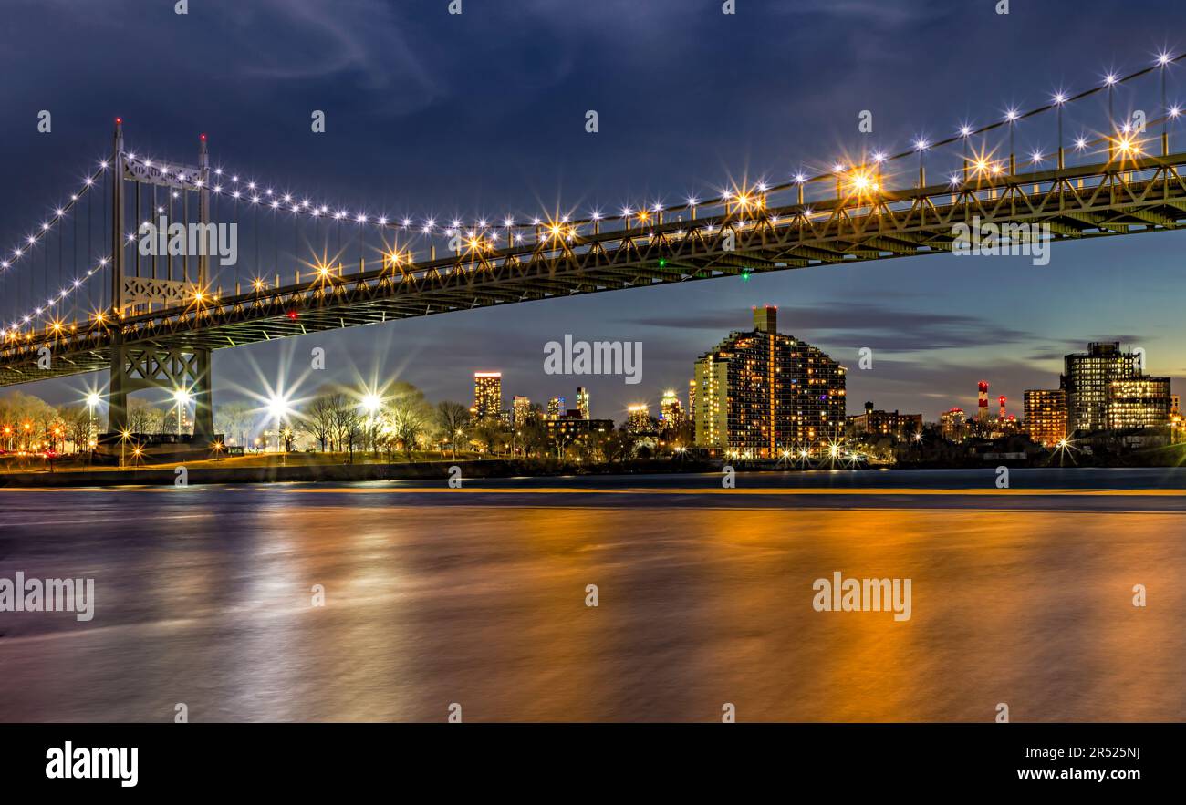 RFK/Triborough Bridges during the blue hour. The bridges link the boroughs of Manhattan, Queens, and the Bronx. It was orignally opened in 1936. It is Stock Photo
