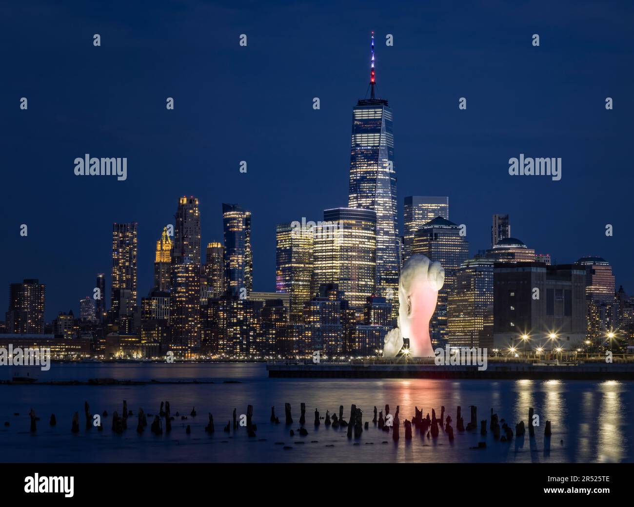 The lower Manhattan New York City skyline showcasing the World Trade Center commonly referred to as the Freedom Tower. Across from the Hudson River is Stock Photo