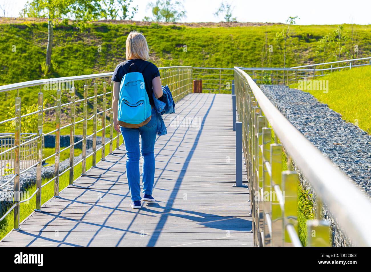Blonde girl woman walks hi-res stock photography and images - Alamy