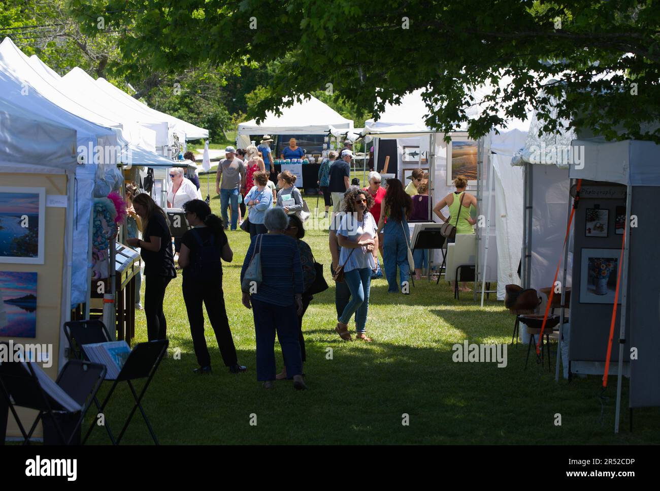 Tents and attendees at an art/craft show in Brewster, Massachusetts (Cape Cod), USA Stock Photo