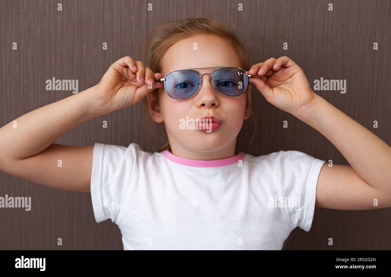 Fashion Cute child girl in sunglasses Stock Photo