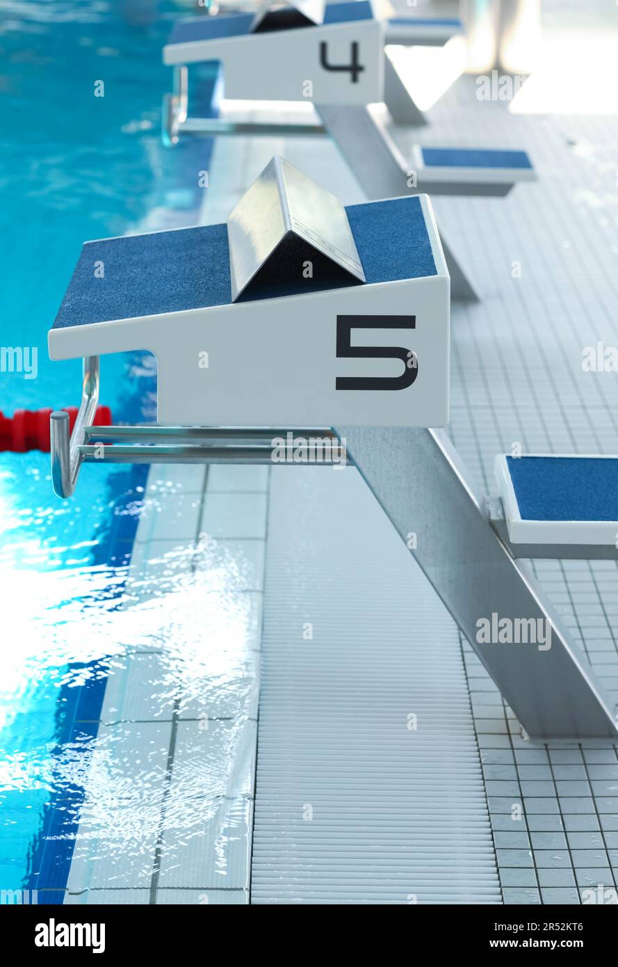 Swimming pool with starting blocks Stock Photo Alamy