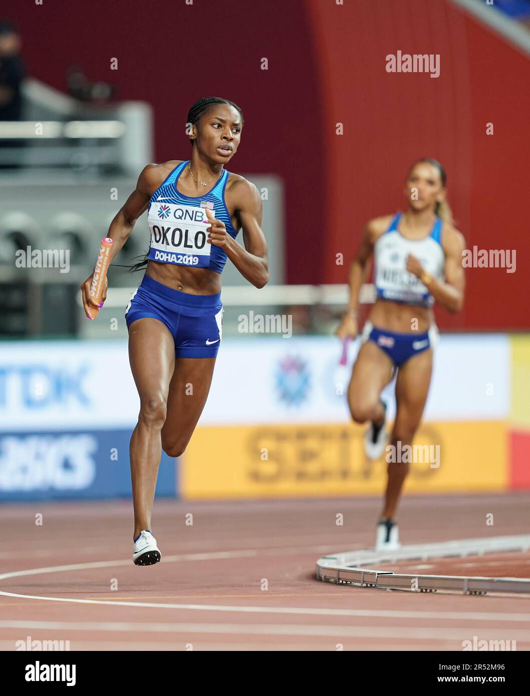 Courtney OKOLO running the 4x400m relay at the 2019 World Athletics