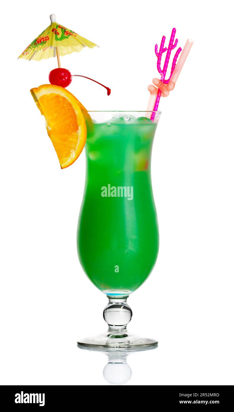 Green alcohol cocktail with orange slice and umbrella isolated on white