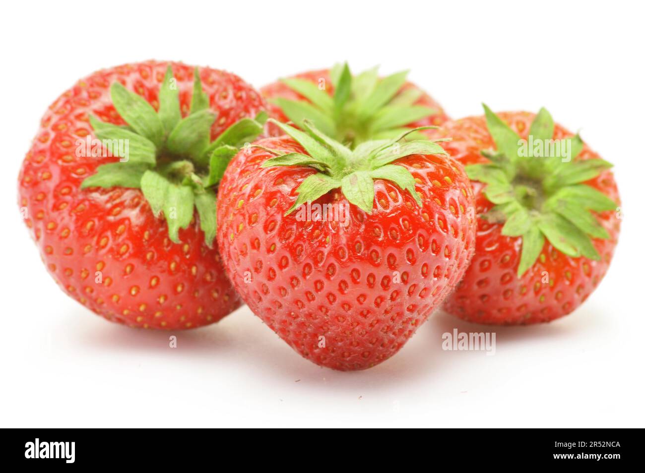 Fresh strawberries isolated on white Stock Photo - Alamy