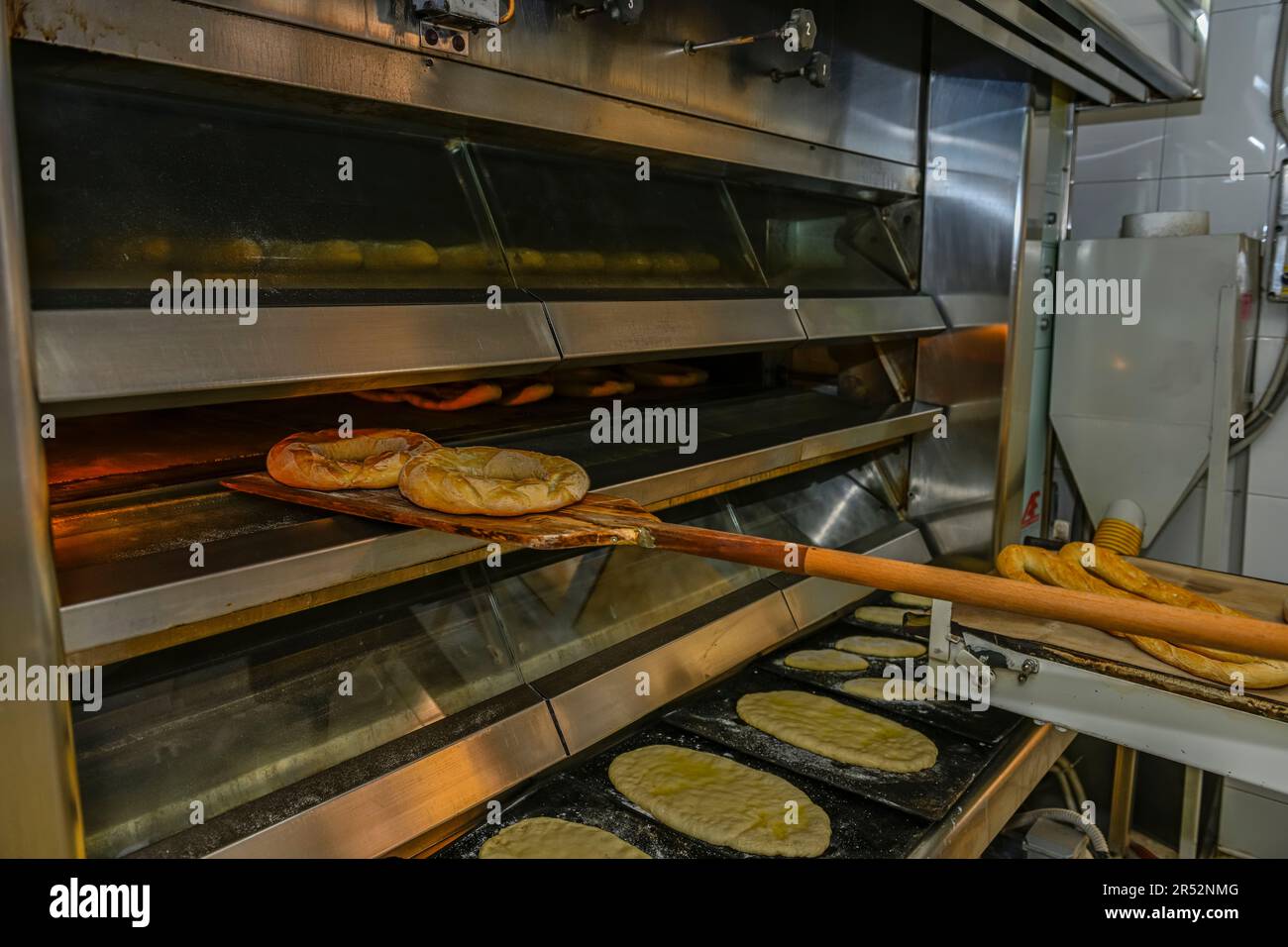 Freshly baked bread in the traditional oven door stock photo alamy
