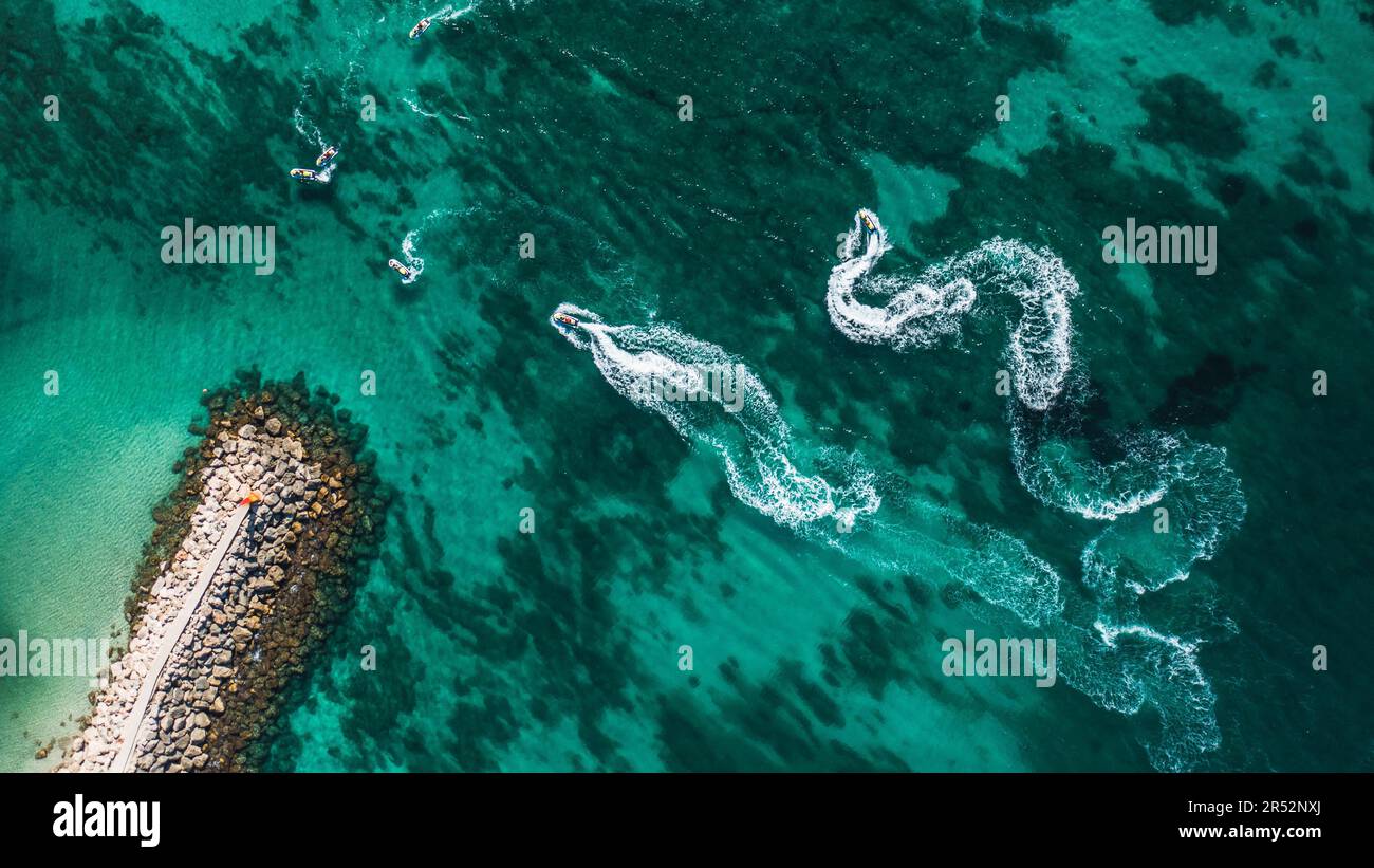 Aerial view on motorboat and jetski on the sea surface Stock Photo - Alamy