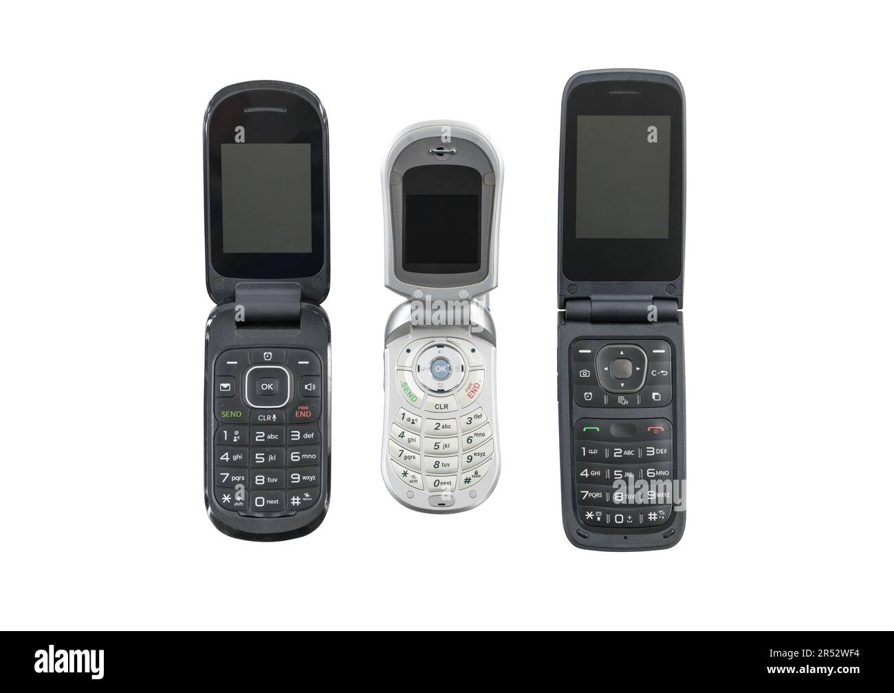 Three old flip cell phones isolated with cut out background Stock Photo
