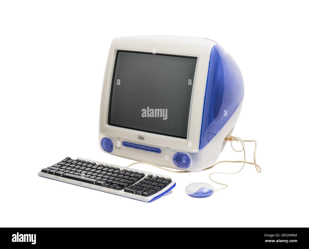 Los Angeles, California, USA - May 29, 2023:  Illustrative editorial photograph of vintage Apple iMac G3 desktop computer with keyboard and mouse. Stock Photo