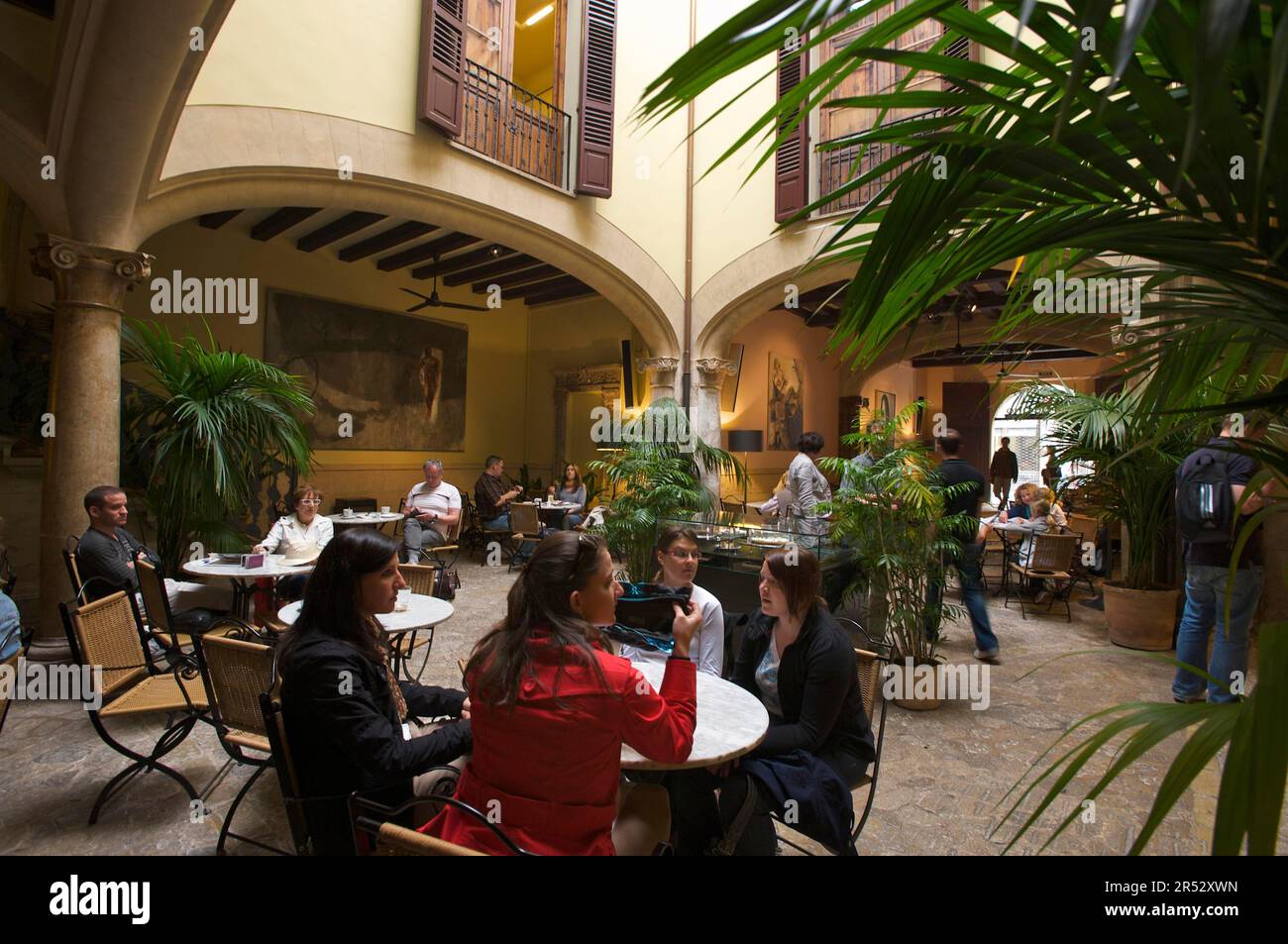 Guests in cafe, courtyard, old town of Palma, Majorca, Balearic Islands, Spain Stock Photo