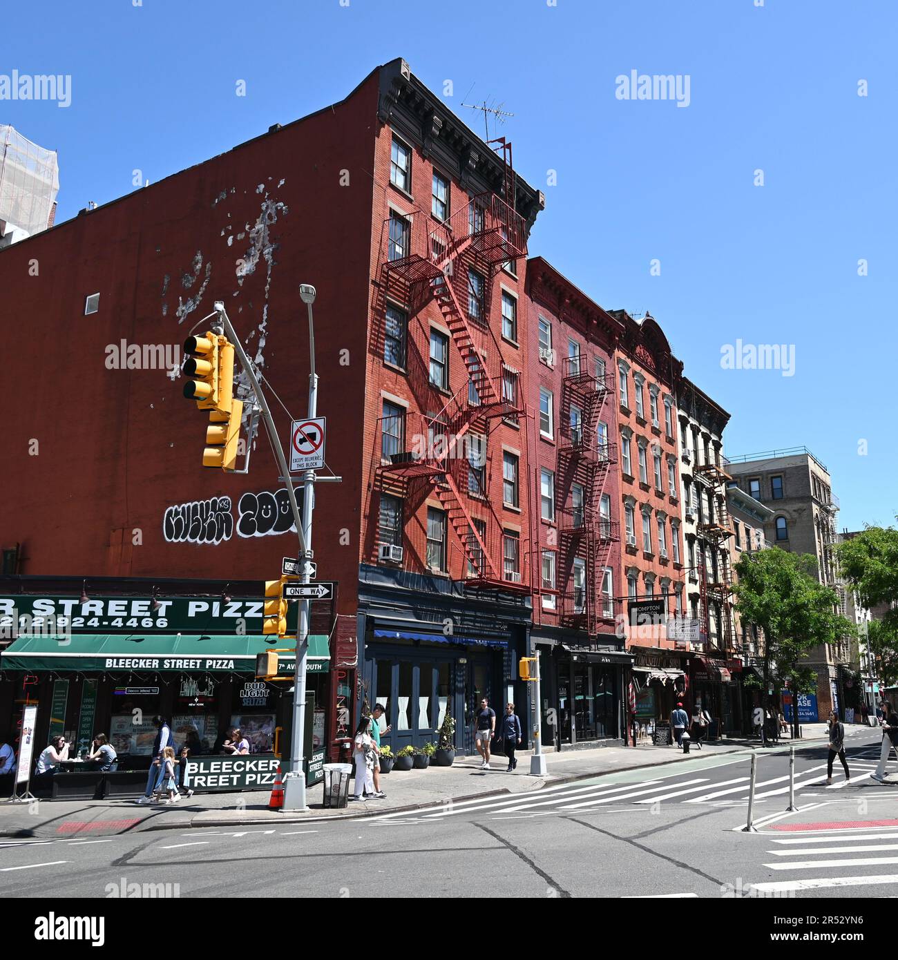 Storefronts and apartments on Bleecker Street in the Greenwich Village neighborhood of Manhattan in New York City. Stock Photo