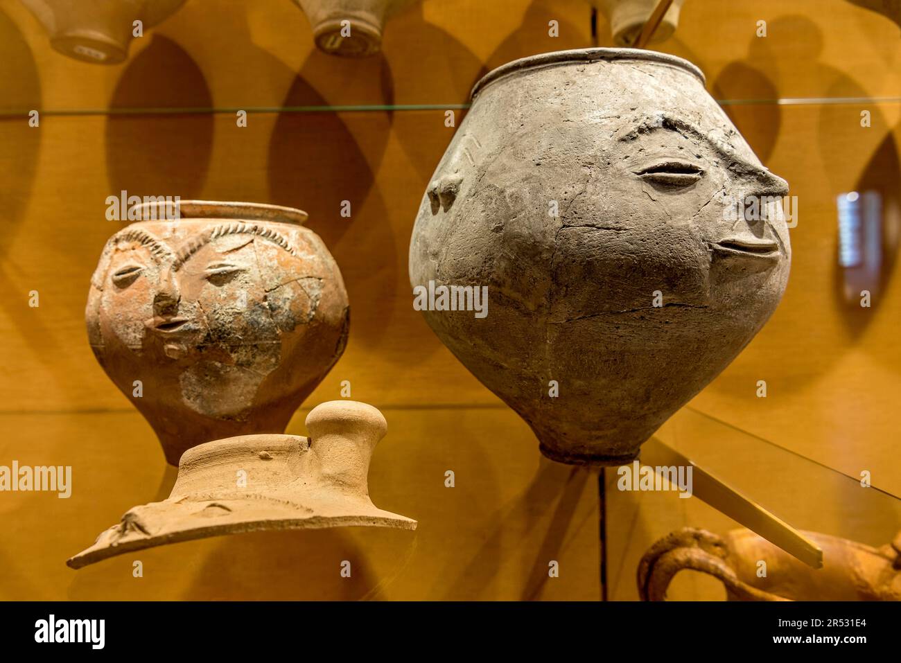 Clay urns, clay pots, storage vessels with face, face urns, Roman fort Saalburg, reconstructed cohort fort, museum, archaeological park, Upper Stock Photo