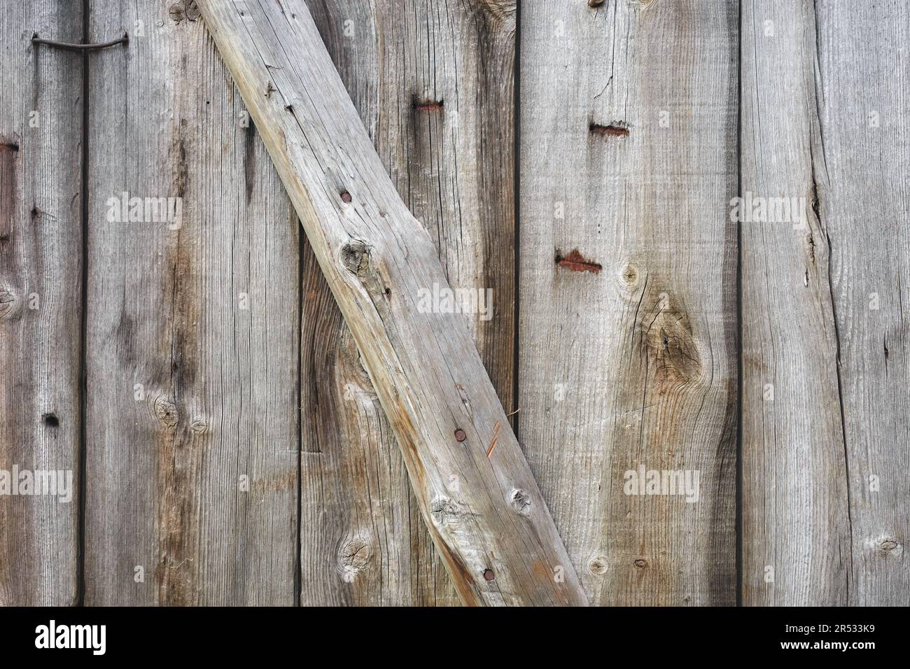 Close up photo of old wooden door, background or wallpaper. Stock Photo