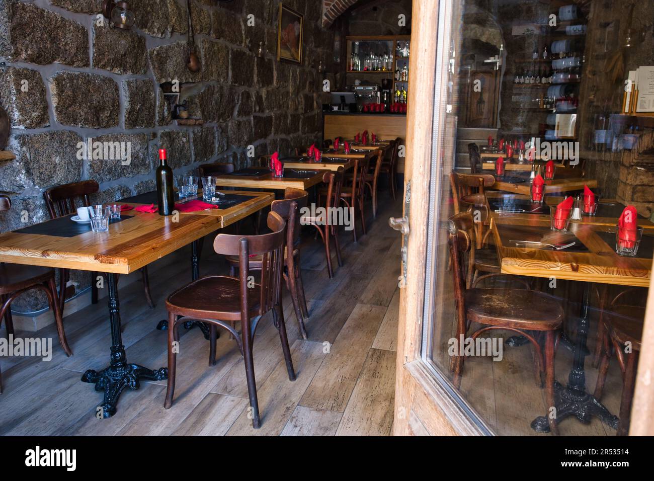 Interior view of a typical restaurant in the old town of Sartene Stock Photo