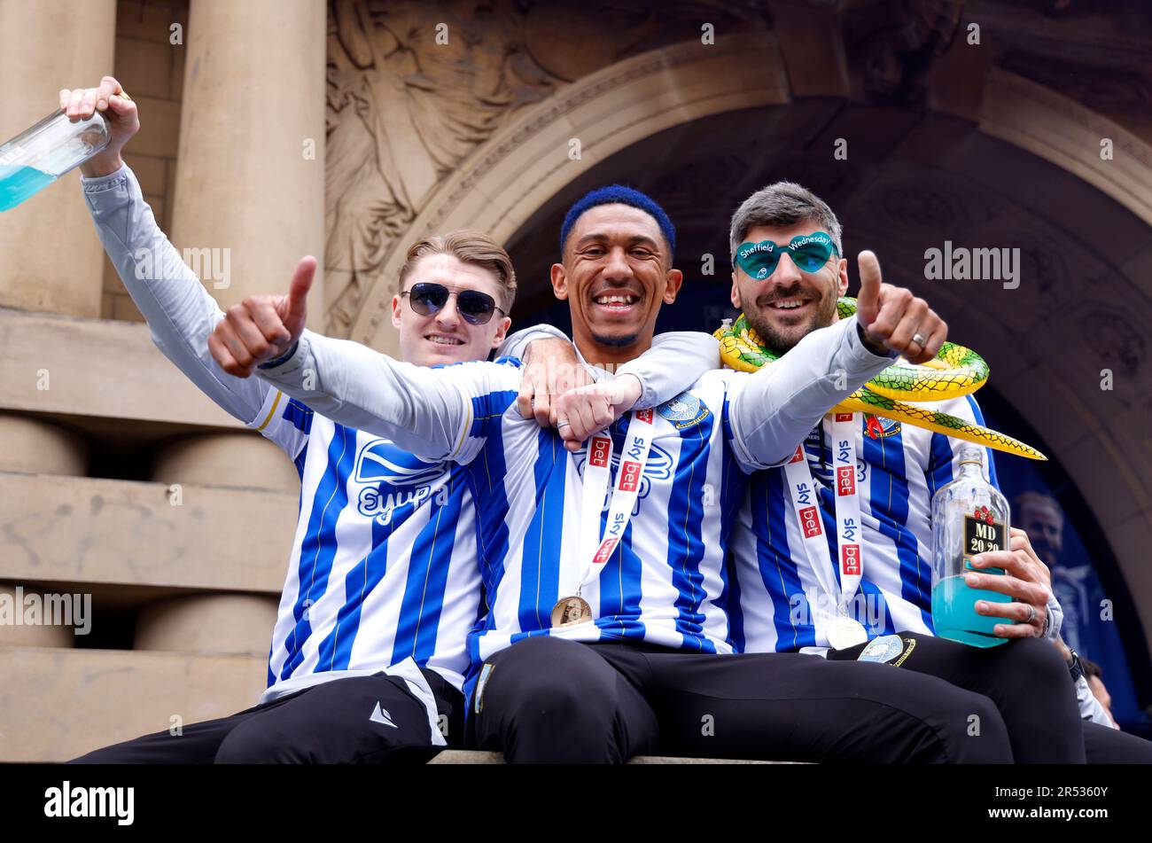 Sheffield Wednesday's George Byers, Liam Palmer and Callum Paterson celebrate their promotion to the Sky Bet Championship at Sheffield Town Hall following an open top bus parade. Sheffield Wednesday secured their promotion to the Championship after Josh Windass scored in injury time at the end of extra-time of the play-off final. Picture date: Wednesday May 31, 2023. Stock Photo