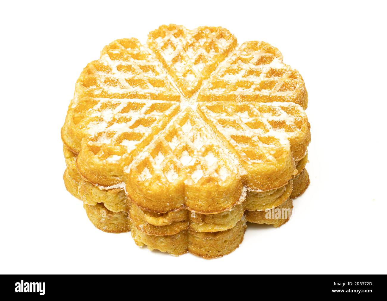 Stack of heart shaped and sugar powdered belgian waffles dessert Stock Photo