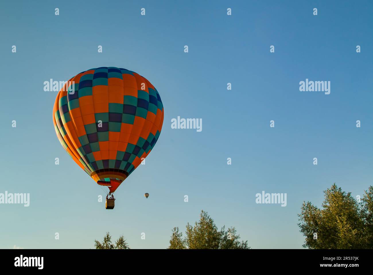 Hot Air Balloon in blue sky Stock Photo - Alamy