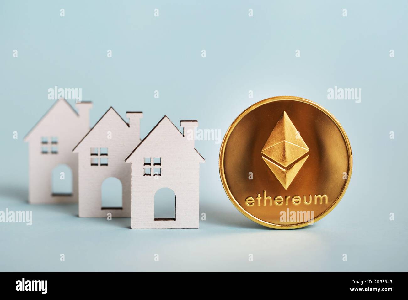 Ethereum coin, wooden house. Tokenizing Real Estate Property. Blockchain  Decentralized Real Estate Market. Rent or buy house for ETH Stock Photo -  Alamy