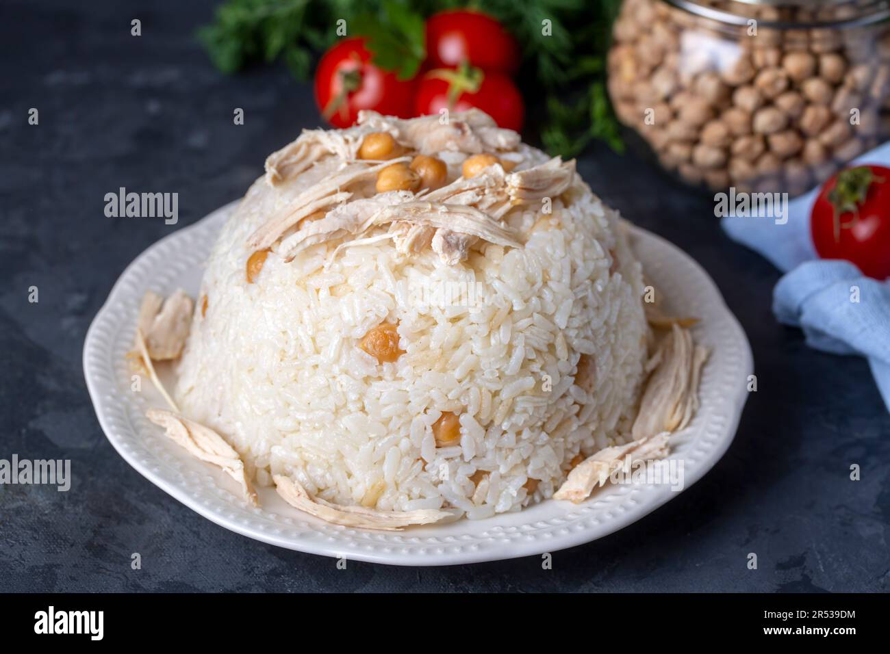 Traditional delicious Turkish food; Rice with chickpeas and chicken ...