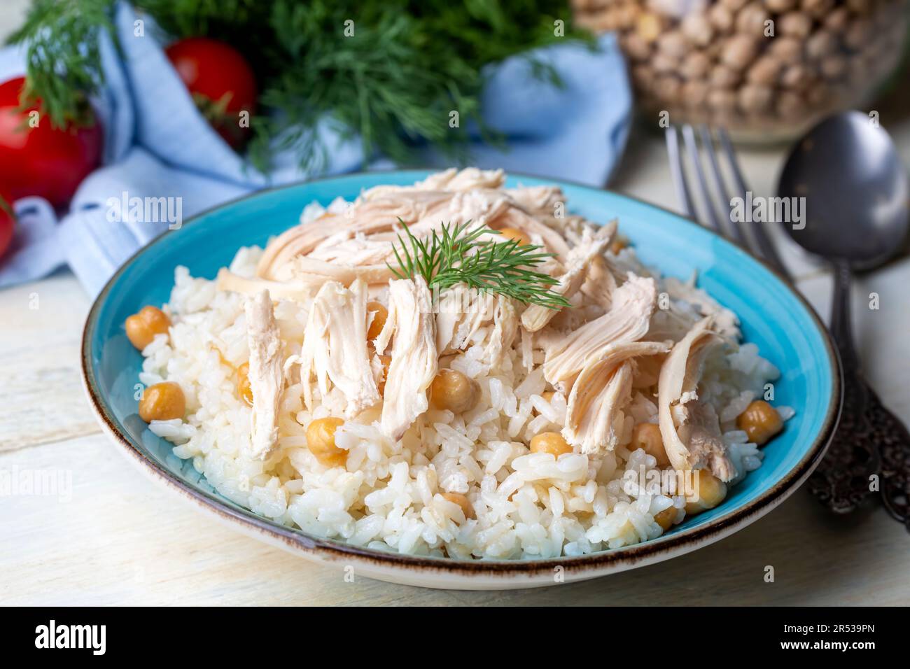 Traditional delicious Turkish food; Rice with chickpeas and chicken ...