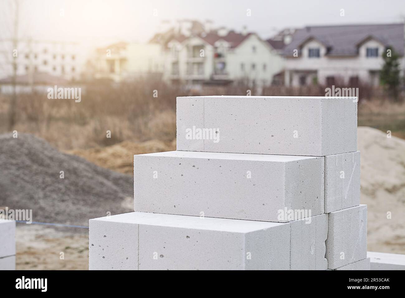 Aerated Concrete on house background. Unfinished house wall made from