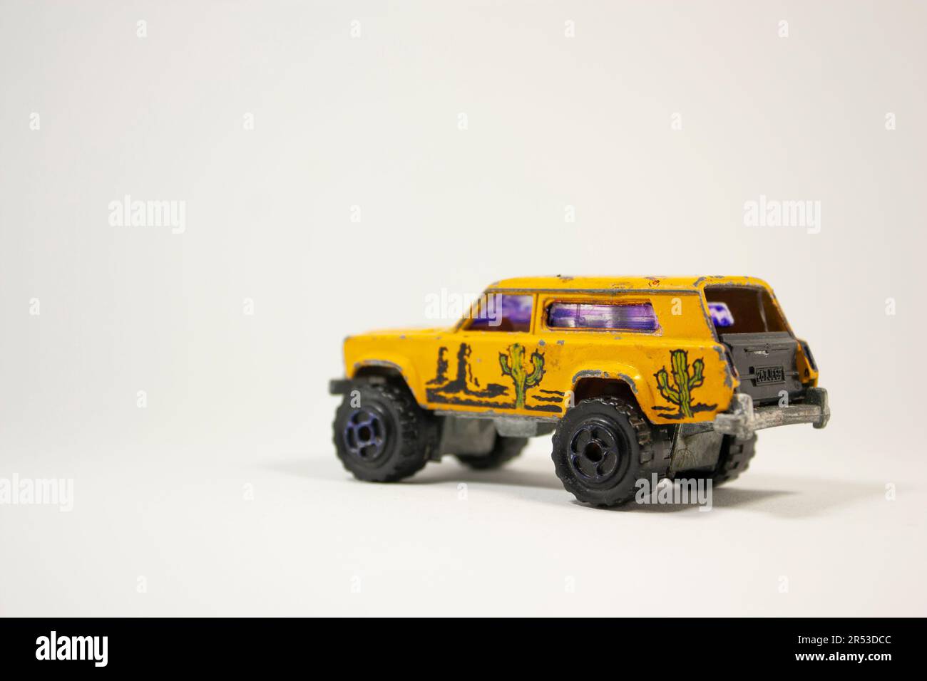 Sport Utility Vehicle toy car red yellow color on white background ...