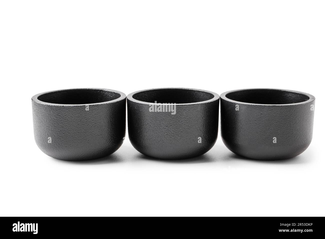 Black tea light candle holders on white background Stock Photo Alamy