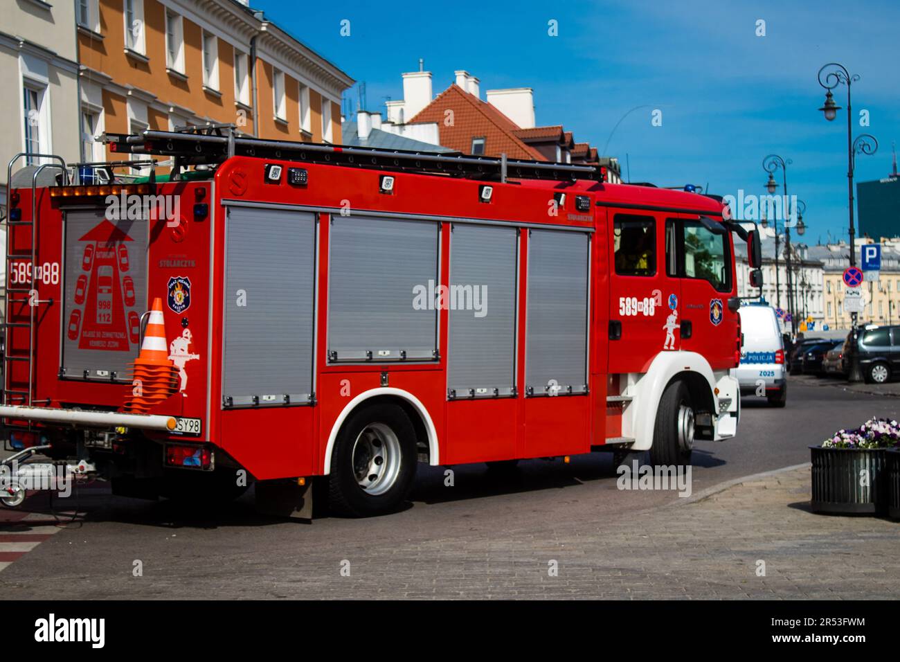 Warsaw, Poland - May 28, 2023 Fire engine driving in the city center of ...