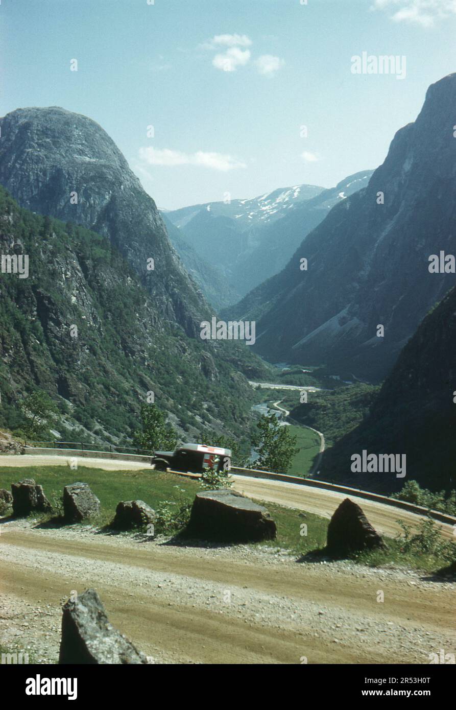 Norway. Circa. 1960 – A Norwegian army ambulance ascending a steep winding road. Stock Photo