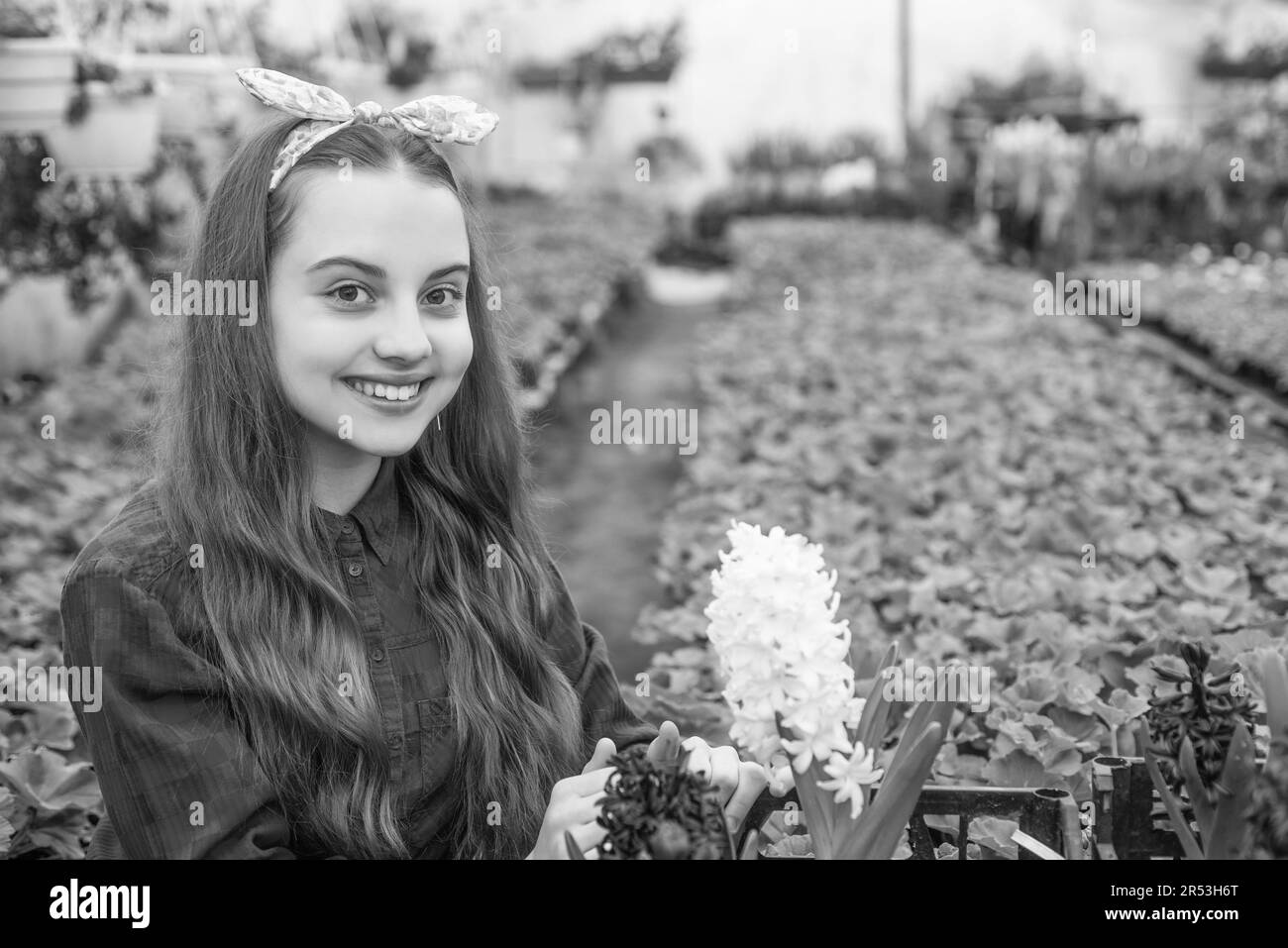 perfect day. planting pot plants. child gardener. flowers in garden. daily chores. Stock Photo