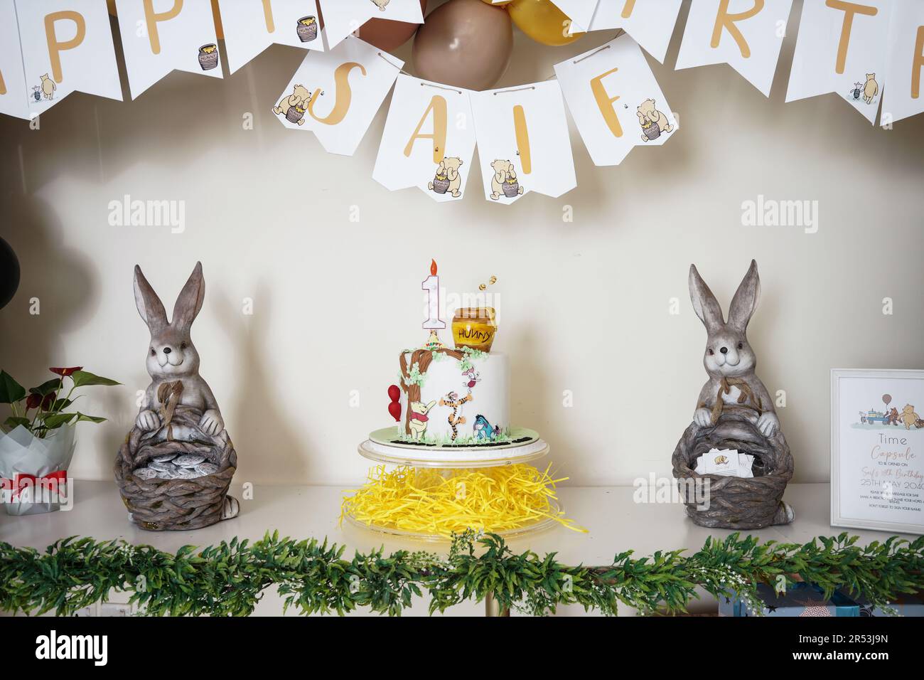 Kids Winnie the pooh birthday party. birthday party boy theme decoration, cake art with table and festive Stock Photo