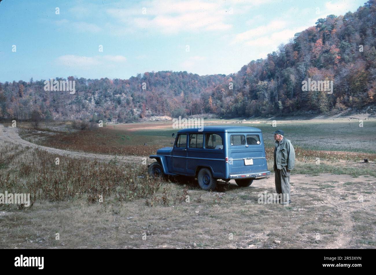 Willys Jeep Utility Wagon at Caney Creek, Kentucky, 1966. Man identified as Floyd S. Carpenter. Stock Photo