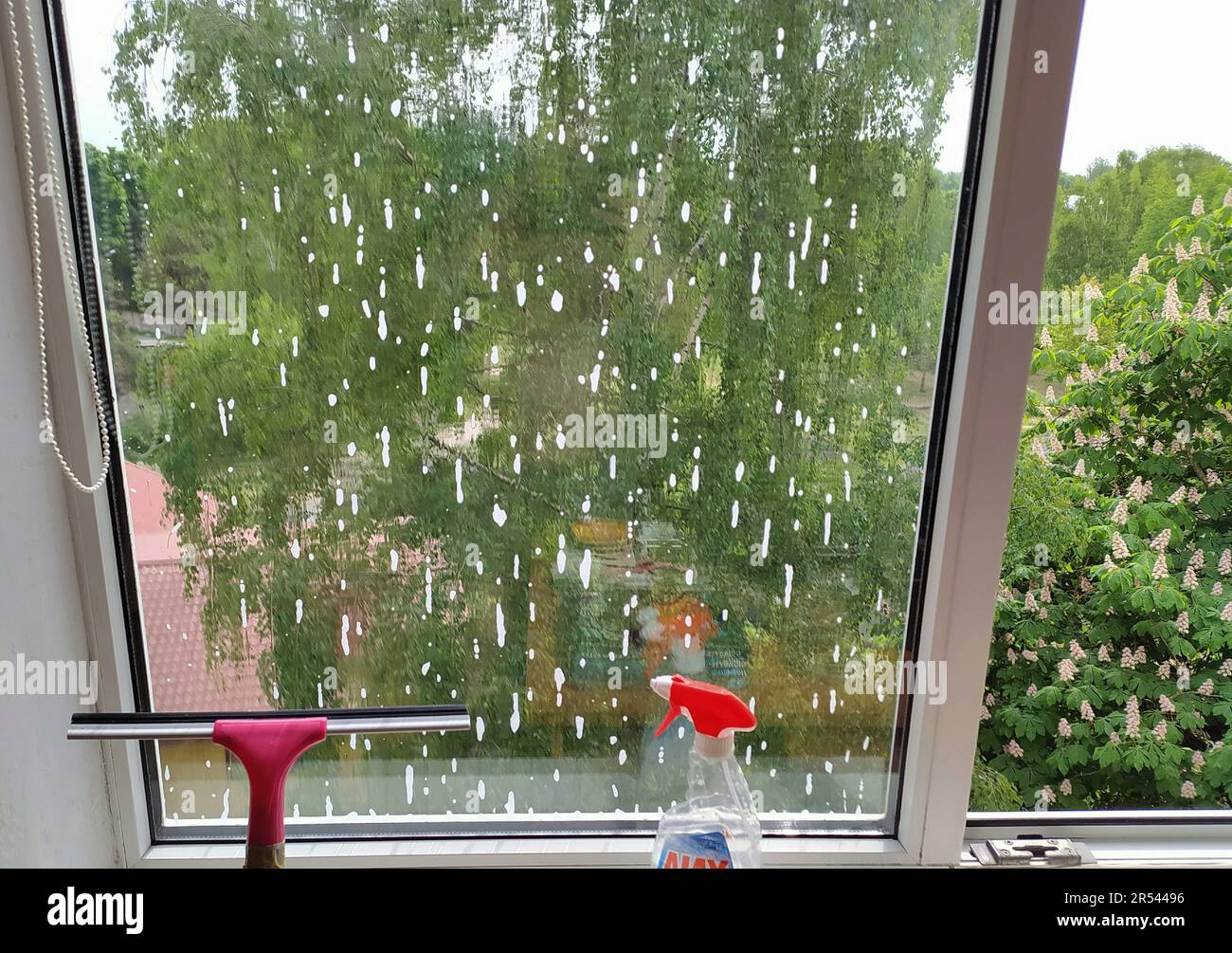 Washing plastic windows. Window cleaning accessories. Outside the